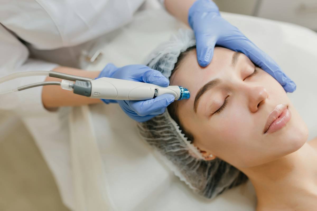 Comparison chart showing how RF, LED, microcurrent, and microneedling work on skin layers for wrinkle reduction
